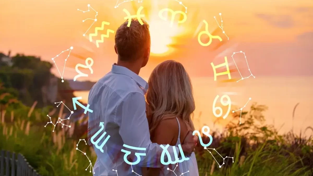 Muž a žena při západu slunce.