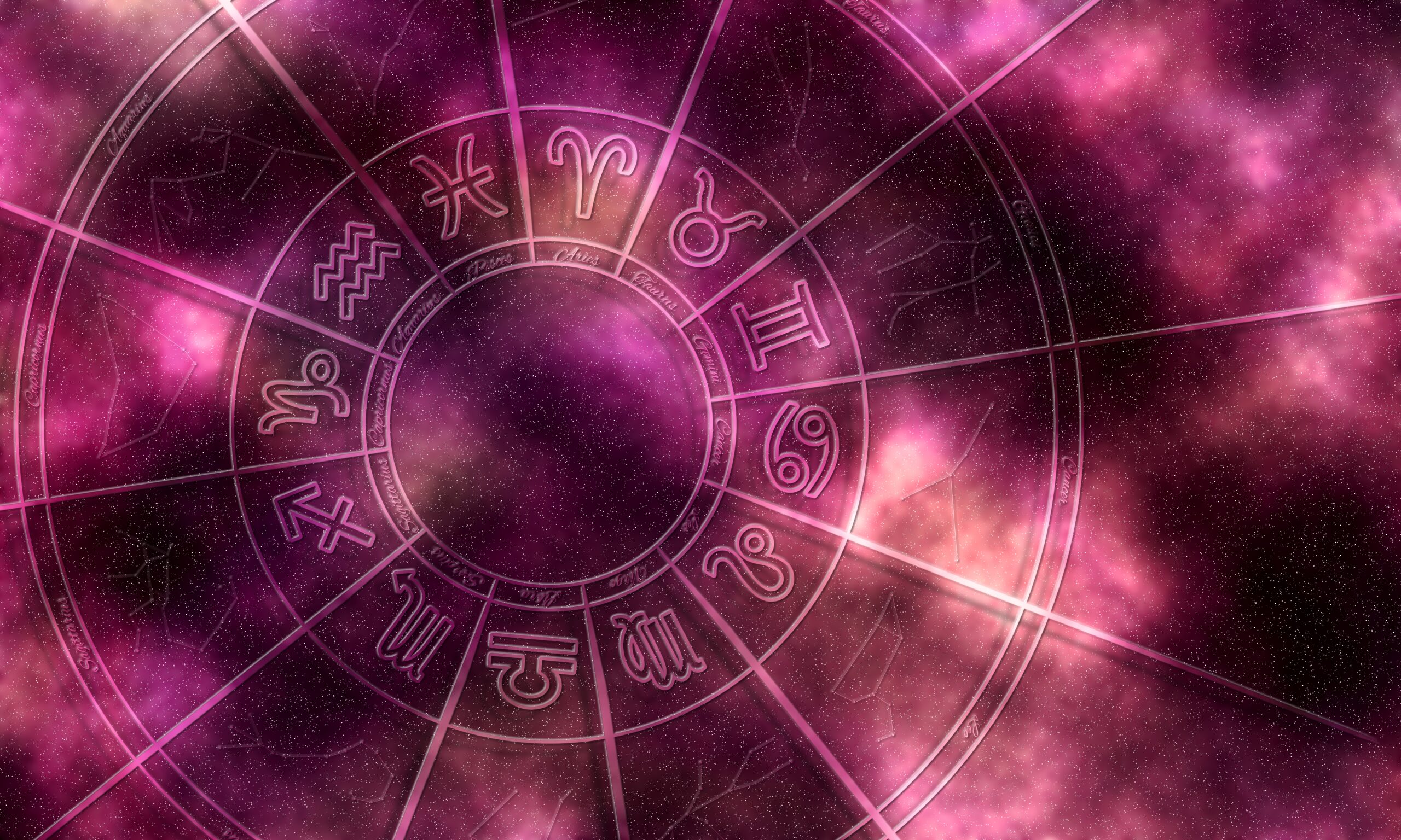 Astrologický kruh a vínovém pozadí