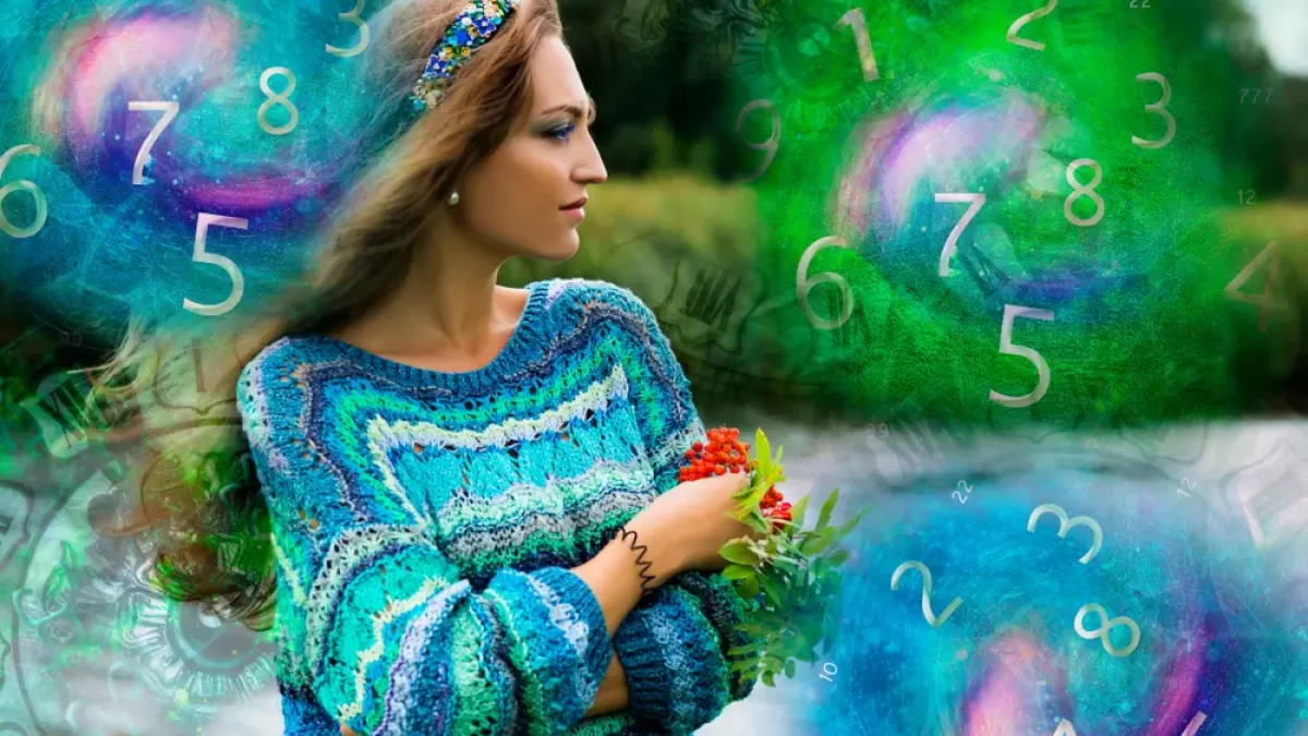 Žena obklopená grafikou se spoustou čísel.
