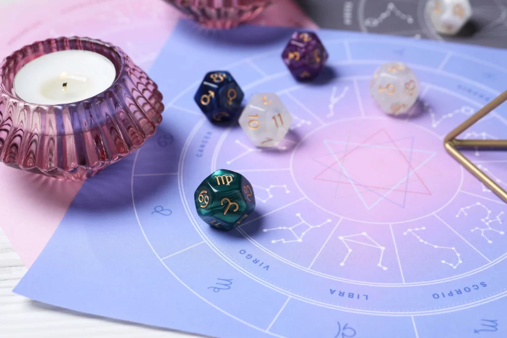 shutterstock_2383749021_optimized - ByznysDeník kameny pro astrologii a svíčka