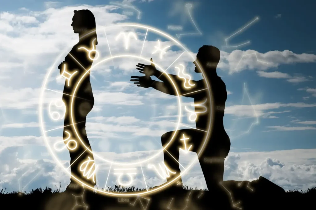 Siluety muže a ženy s astrologickým kruhem znamení zvěrokruhu